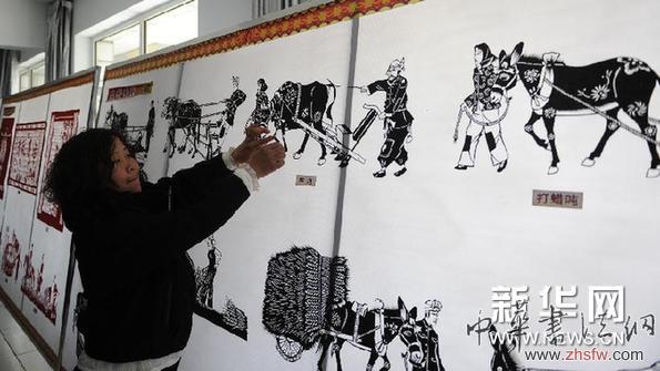 （社会）（1）李环秀和她的剪纸讲堂