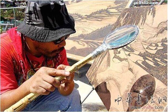 放大镜作画笔太阳光当颜料