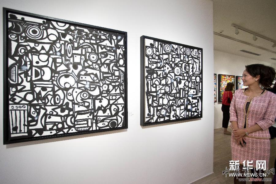 《闭上眼睛看世界》严阵诗画展在京开展 图