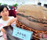 三峡奇石“选美”“渔舟唱晚”折桂