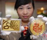 新年未至 蛇年生肖金银币早早“爬”上柜
