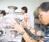河北平山发现百座古墓 千年夫妻牵手合葬
