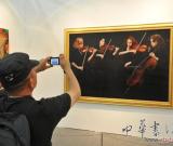 陈逸飞最高价位油画惊现2010上海艺博会展馆世贸商城